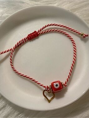 Red/white evil eye protection string bracelet